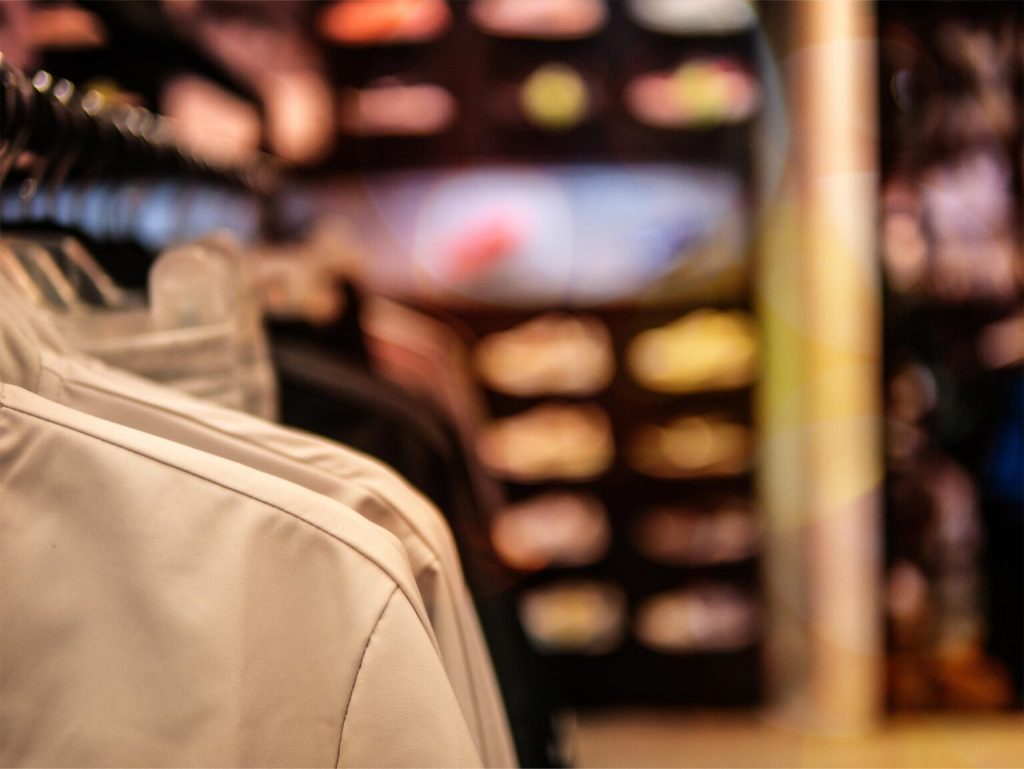 closeup of apparel on retail racks