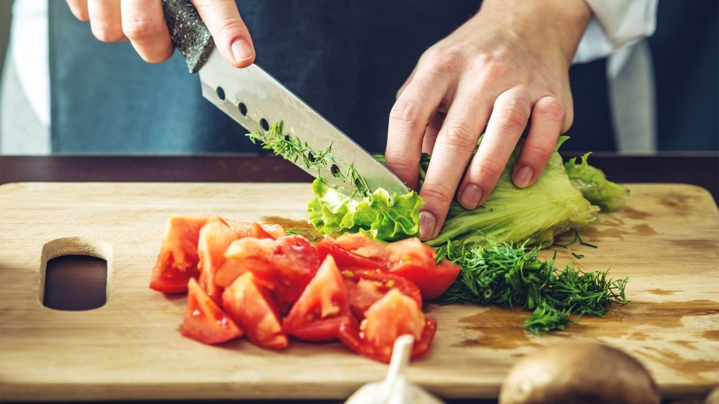 chef cutting vegetables